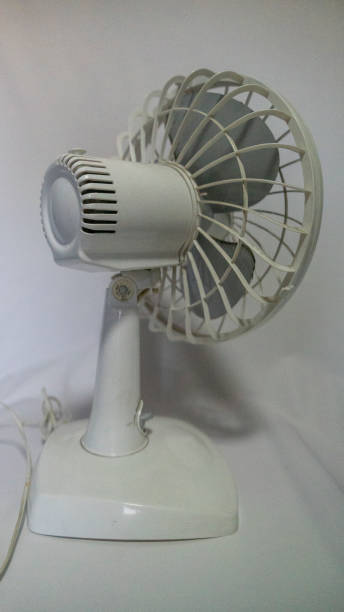 istock Small white fan with 4-blade propeller repair 2023657389