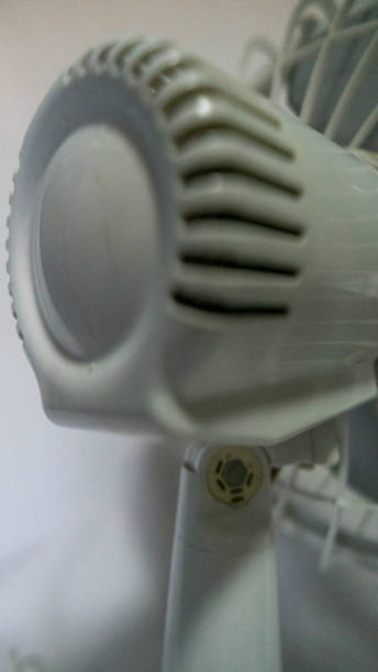 istock Small white fan with 4-blade propeller repair 2023657908
