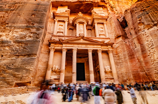 Large interesting tourist complex of the ancient city of Petra with tourists