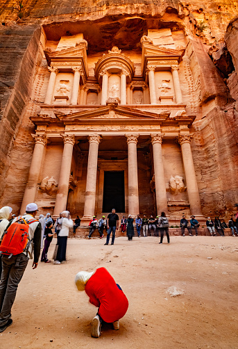 Pertra, Jordan - 29 March 2019: Large interesting tourist complex of the ancient city of Petra with tourists