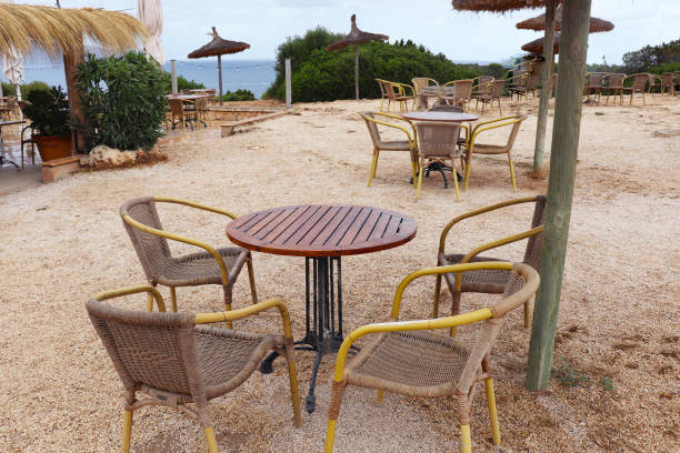 istock tables and an umbrella from a straw 2023686558