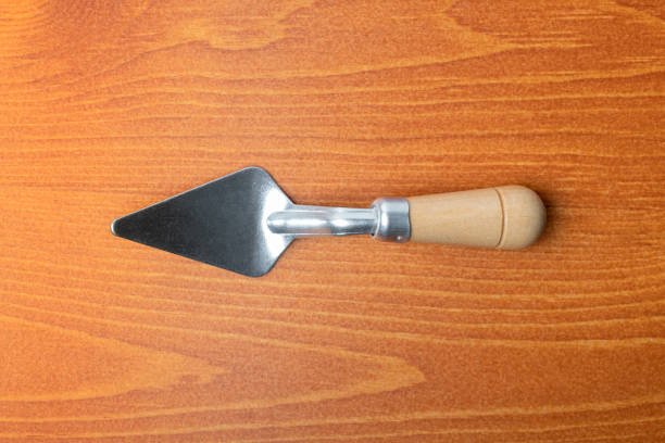 istock Mini Spatula Trowel Building and construction equipment,  Construction wall concept. Copy space 2023690150