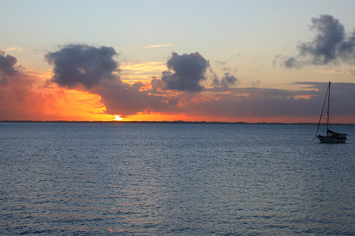 Sunset and clouds in the Bahamas at Elbow Cay.