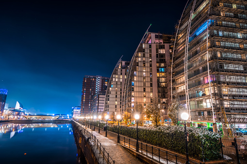 Salford area of Manchester with residential buildings during night