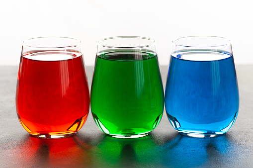 Rgb color water in glass on table, Rgb color model concept