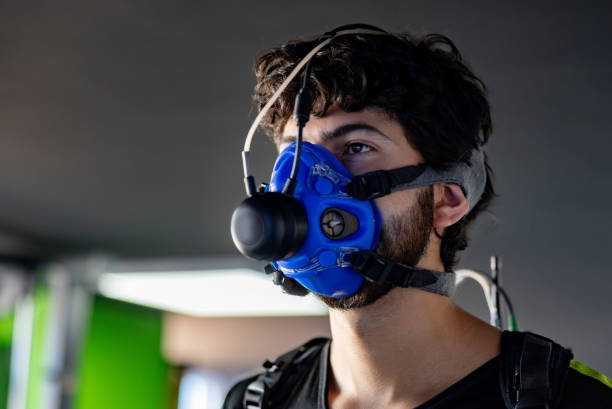 Young Latin American man taking a stress test at a health club - fitness concepts