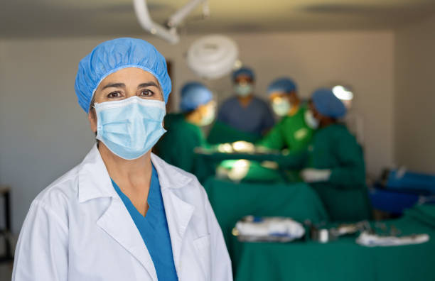 istock Surgeon teaching a group of medical students in the operating room 2023730575