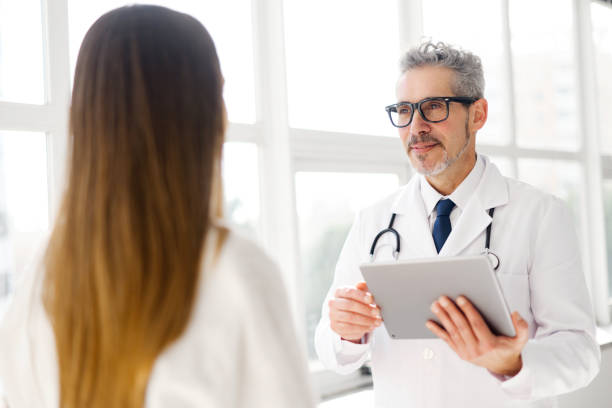 istock A conversation between a healthcare professional and a patient during appointment 2023763837