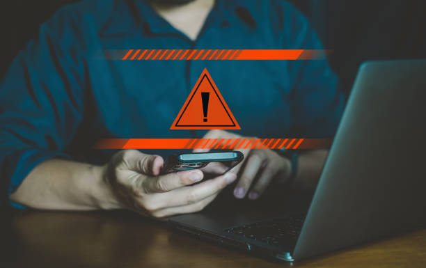 istock Emergency warning alert alarm on Smartphone, Data network protection, Virus alarm. 2023827334