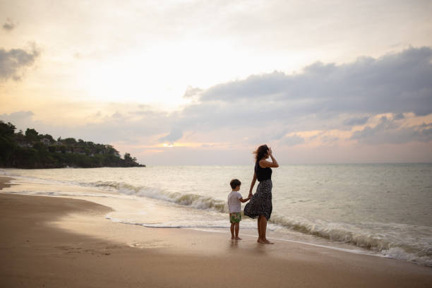 istock Mother and son by the sea 2023841885
