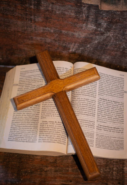 istock Wooden cross on bible 2023851710