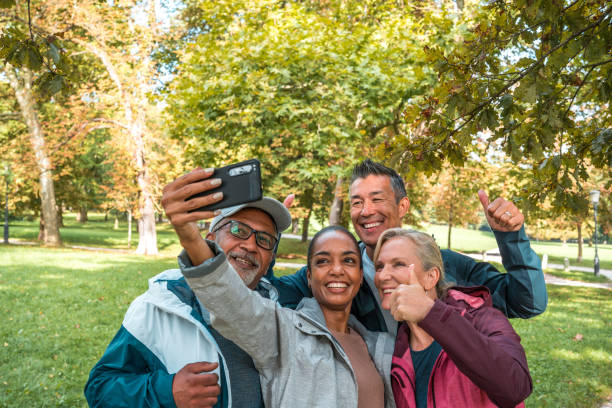 istock Diverse Friends' Post-Workout Selfie in the Park 2023868294