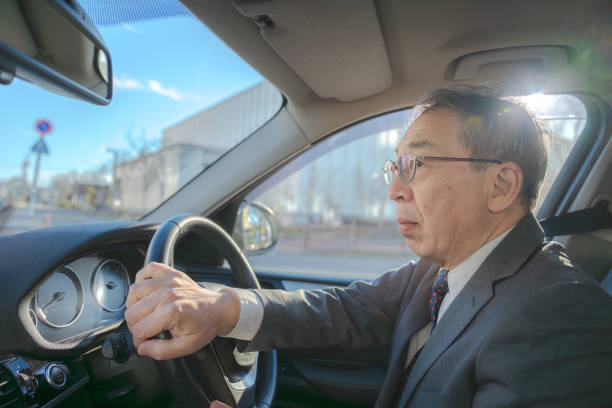 old businessman driving