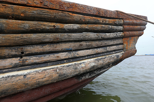Close up of wooden fishing boat, North China