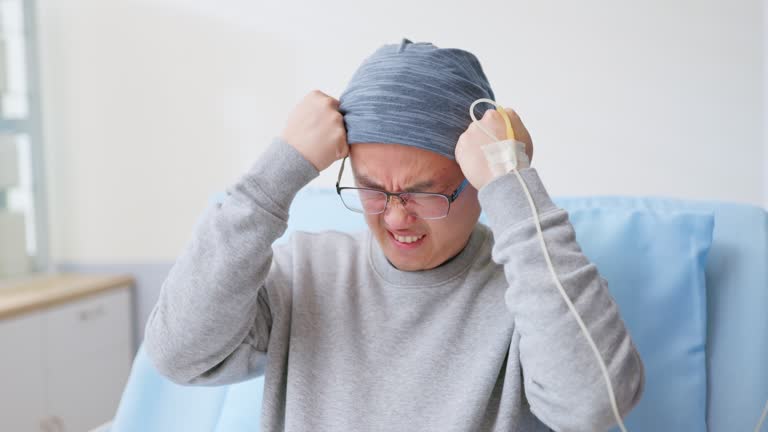 male cancer patient has headache