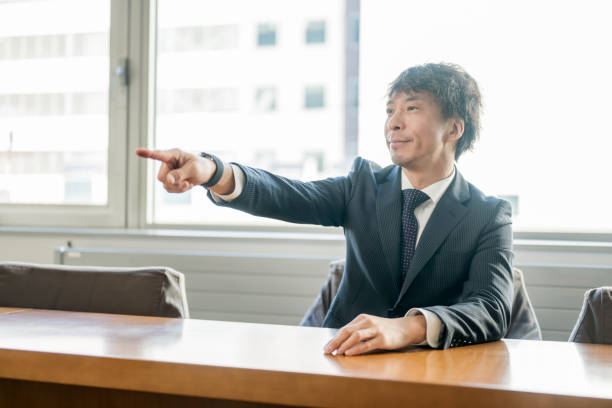 ビジネスマンとの出会い - しかる 男性 日本人 ストックフォトと画像