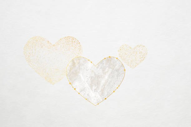 Yellow heart shape crystal on white paper background