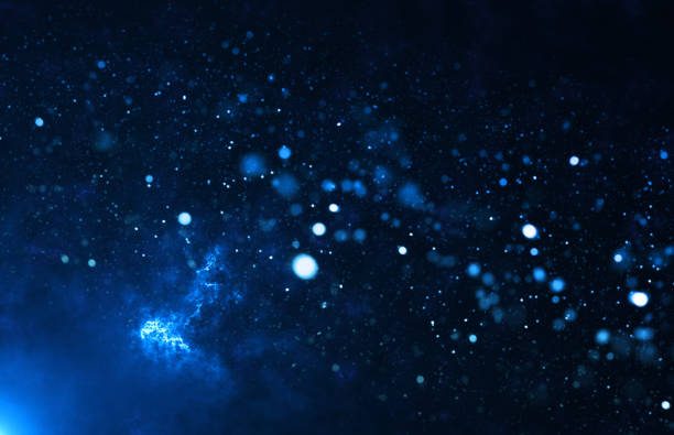 istock Dark blue background. Bokeh light lights effect background. Christmas glowing dust background. Christmas Abstract stylish light effect on a blue background. 2024117120