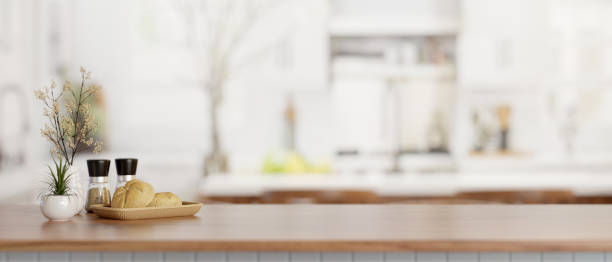 istock A bread basket, spice bottles, and a copy space on a wooden kitchen countertop in a modern kitchen. 2024274004