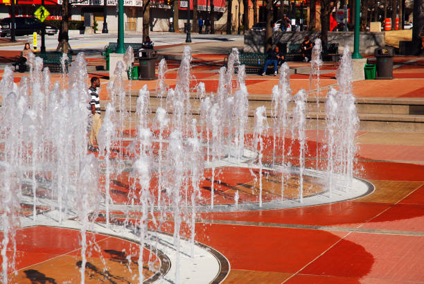 Atlanta, GA, USA March 1 Water fountains spout in the shape of Olympic Rings, commemorating the Summer Games in 1996 at Olympic Park in Atlanta