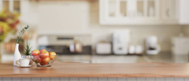 istock A copy space for display your product on a wooden kitchen tabletop in a cozy minimal kitchen. 2024303615