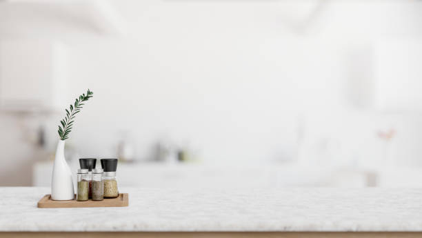 istock Marble counter top with empty space for display product with blurred background of a white kitchen. 2024303899