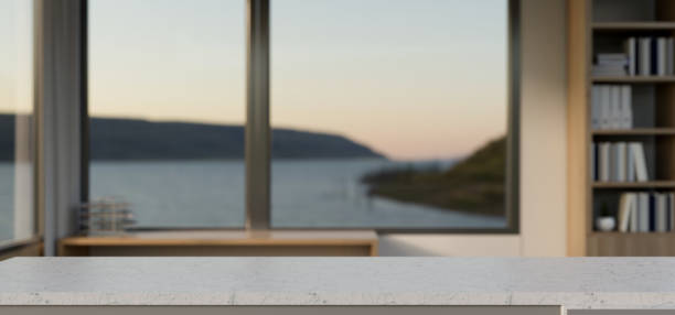 istock A marble white tabletop with empty space for display product in a minimal home office room. 2024305442