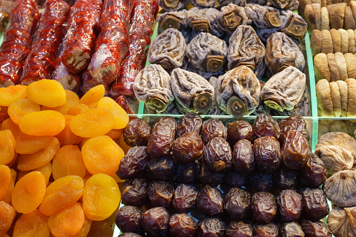 Dried fruits, sweetness, figs, dried apricot and dates sell on the Egyptian market in Istanbul, Turkey