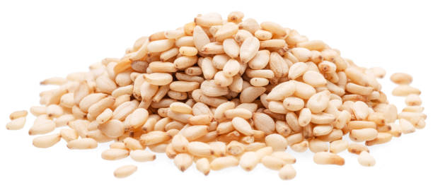 istock White seeds of sesame isolated on white background. 2024460485