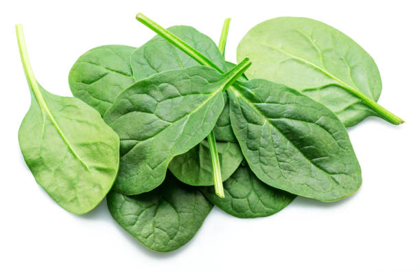 istock Green fresh spinach leaves isolated on white background. 2024461049
