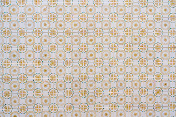 Ceramic square  tiles with small ornamental mosaic pieces. Old tiles abstract pattern, background