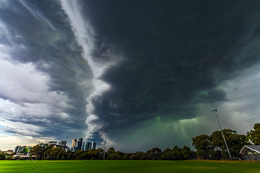 Severe thunderstorm over Melbourne eastern suburbs at Box Hill on Tuesday Feb 13, 2024. This severe storm caused havoc in the city and surrounding suburbs and nearby regions with widespread damage to the power network causing extensive blackouts. The green areas in the storm indicates the presence of ice and large hail. Box Hill business centre provides a focus for the dramatic image.