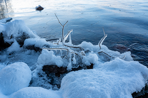 Close up of snow and ice on lakeside of Vattern Motala Sweden February 9 2024