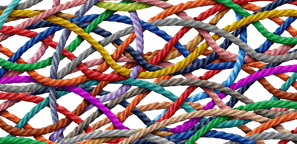 Complicated Entanglement Connections as overlapping diverse ropes representing challenges in business and in life.
