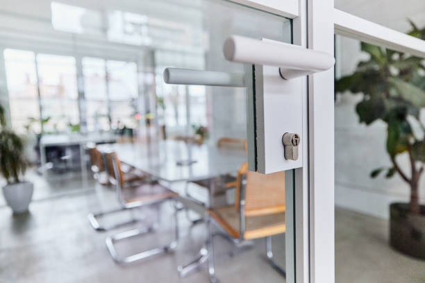 istock Close up of glass door of an office. 2024664607