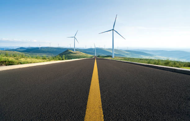 istock Wind Turbine and road 2024696914