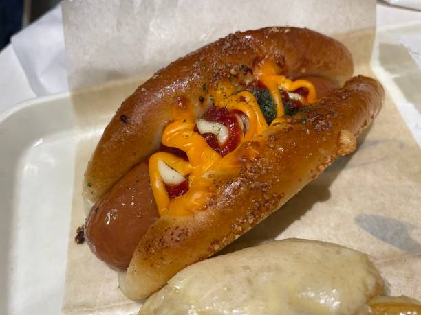 istock Hot dog with frankfurter in between 2024730694