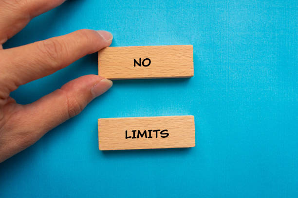 istock No limits words written on wooden blocks with blue background 2024770498