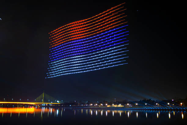 February 15 Belgrade, Serbia, Independence Day greeting celebration background with fireworks and drones and lighting effects