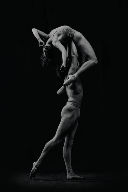 istock Expressive, artistic man and woman , ballet dancers making sensual, passionate performance, dancing. Black and white 2024823194