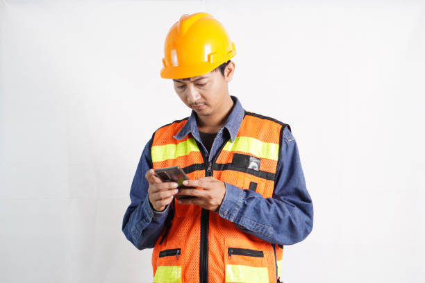 istock Asian engineer handsome man or architect looking forward with white safety helmet. prepare modern building construction. Worker asian man looking pose 2024839436