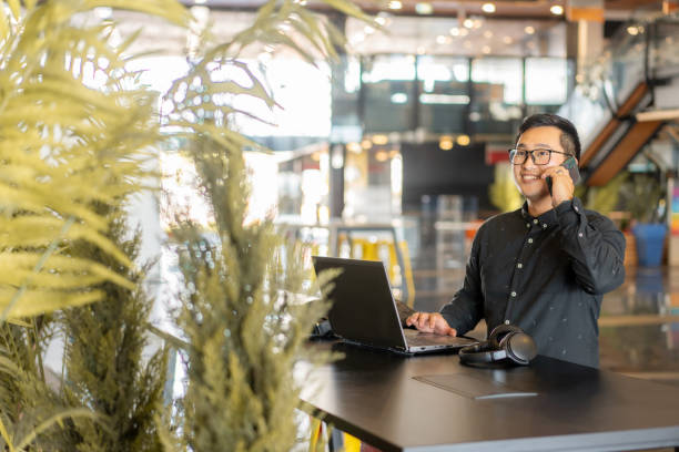 istock Asian Young Professional Making a Phone Call 2024847154