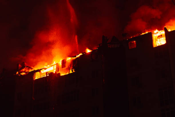 istock Burning house is engulfed in flames at night during the disastrous 2024862941