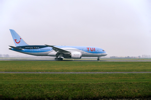 TUI Airlines Belgium OO-JDL Boeing 787 aircraft makes a landing on Polderbaan upon arrival at Amsterdam Schiphol airport Netherlands