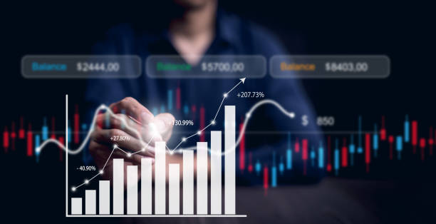 istock Business people interacting with laptops, featuring stock tickers or graphs, cryptocurrency and new trading platforms, ideas and perspectives, Stock investment, New technology 2024897269