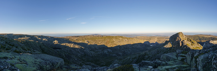 Beautiful panorama of rocky landscape of high plateau of Torre with little vegetation on a sunny autumn day, Torre, Serra da Estrela, Portugal