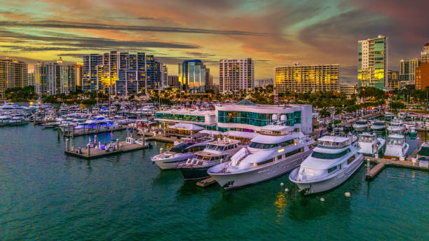 istock many boats in the water by some buildings and sky behind them 2024918365