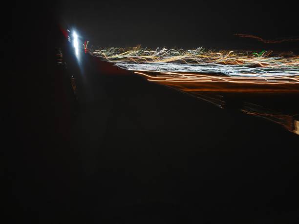 istock The focused abstract image of The light trail view from airplane window 2024965327
