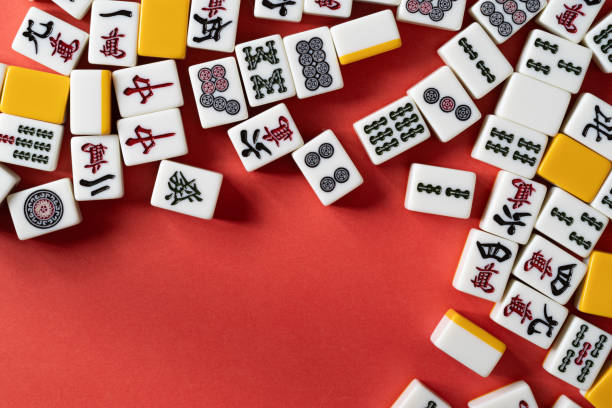 istock mahjong tiles on red background 2024972571