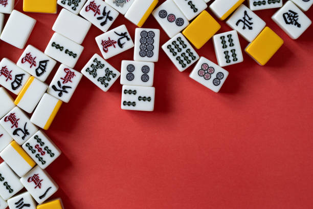 istock mahjong tiles on red background 2024972863
